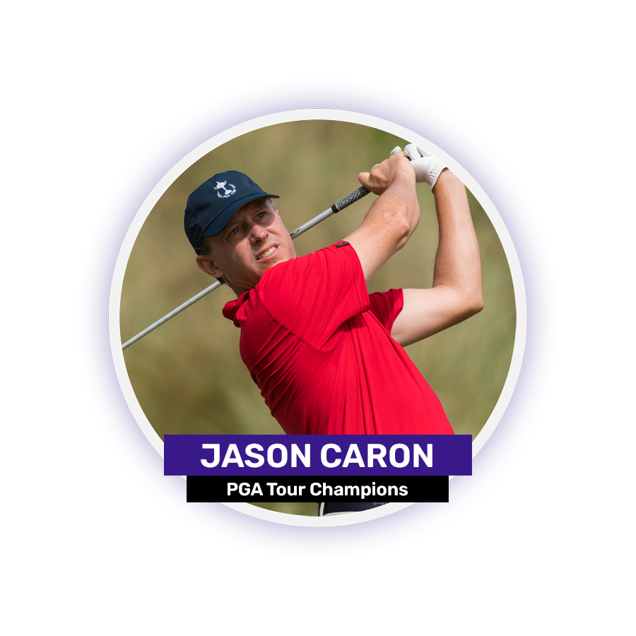 A golfer in a red shirt and cap swings a club on a grassy course.